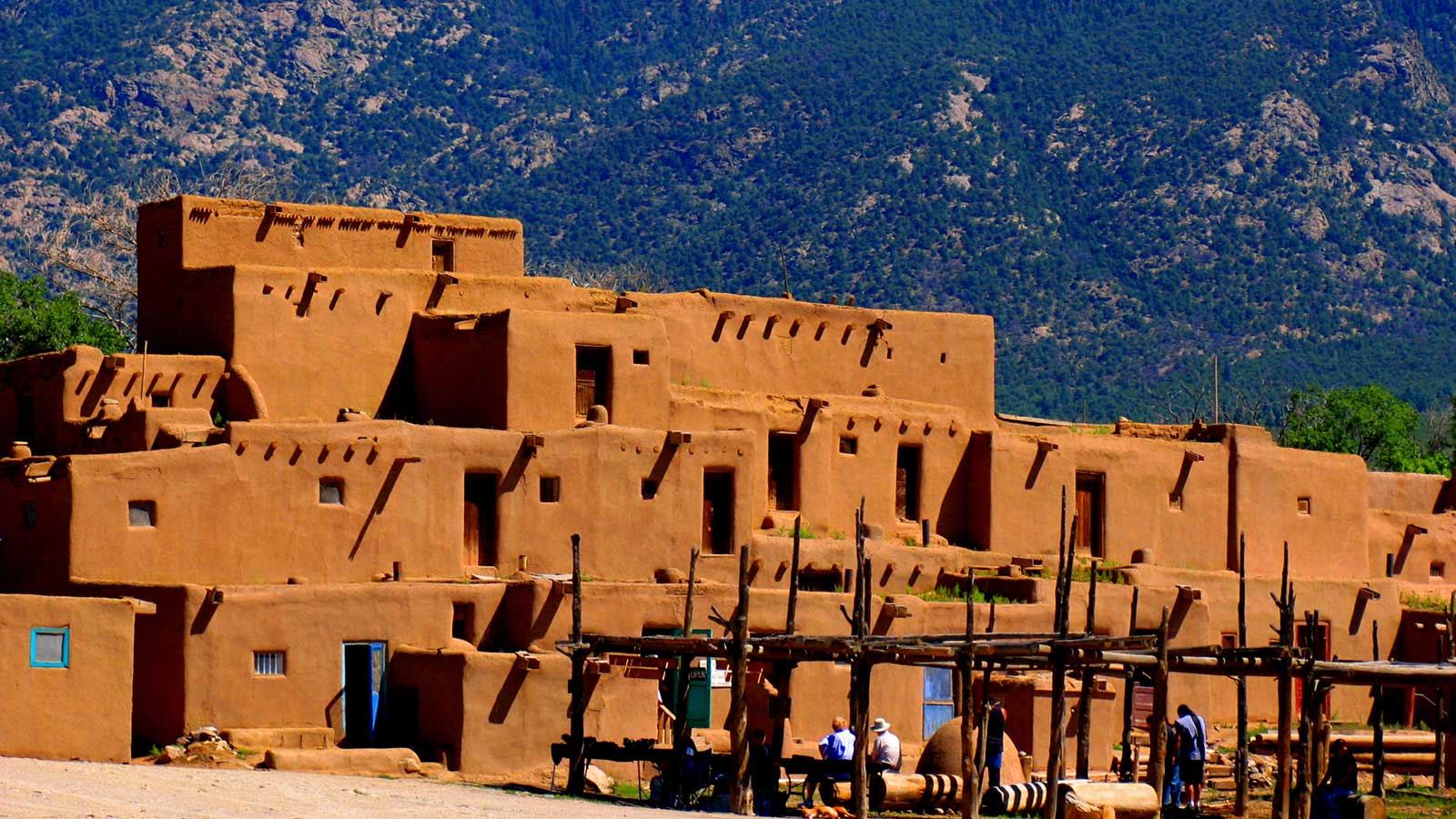 unm-taos-featured UNM Taos campus at night with logo overlayed