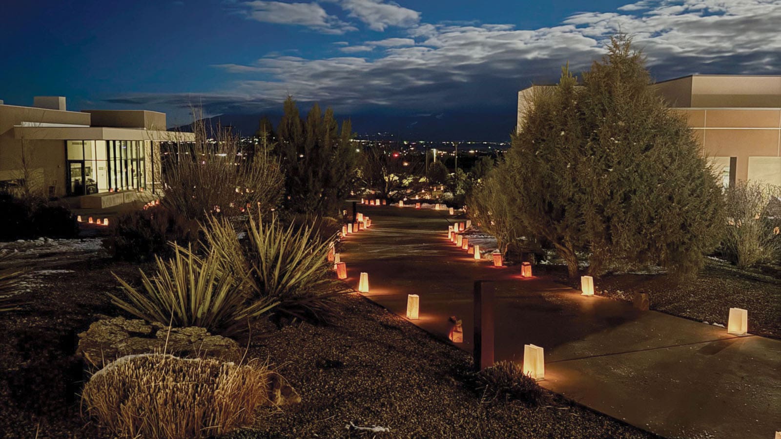 unm-taos-featured UNM Taos campus at night with logo overlayed
